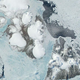 October Revolution Island, site of the Vavilov Ice Cap, lies at the center of this 2001 NASA satellite image.
